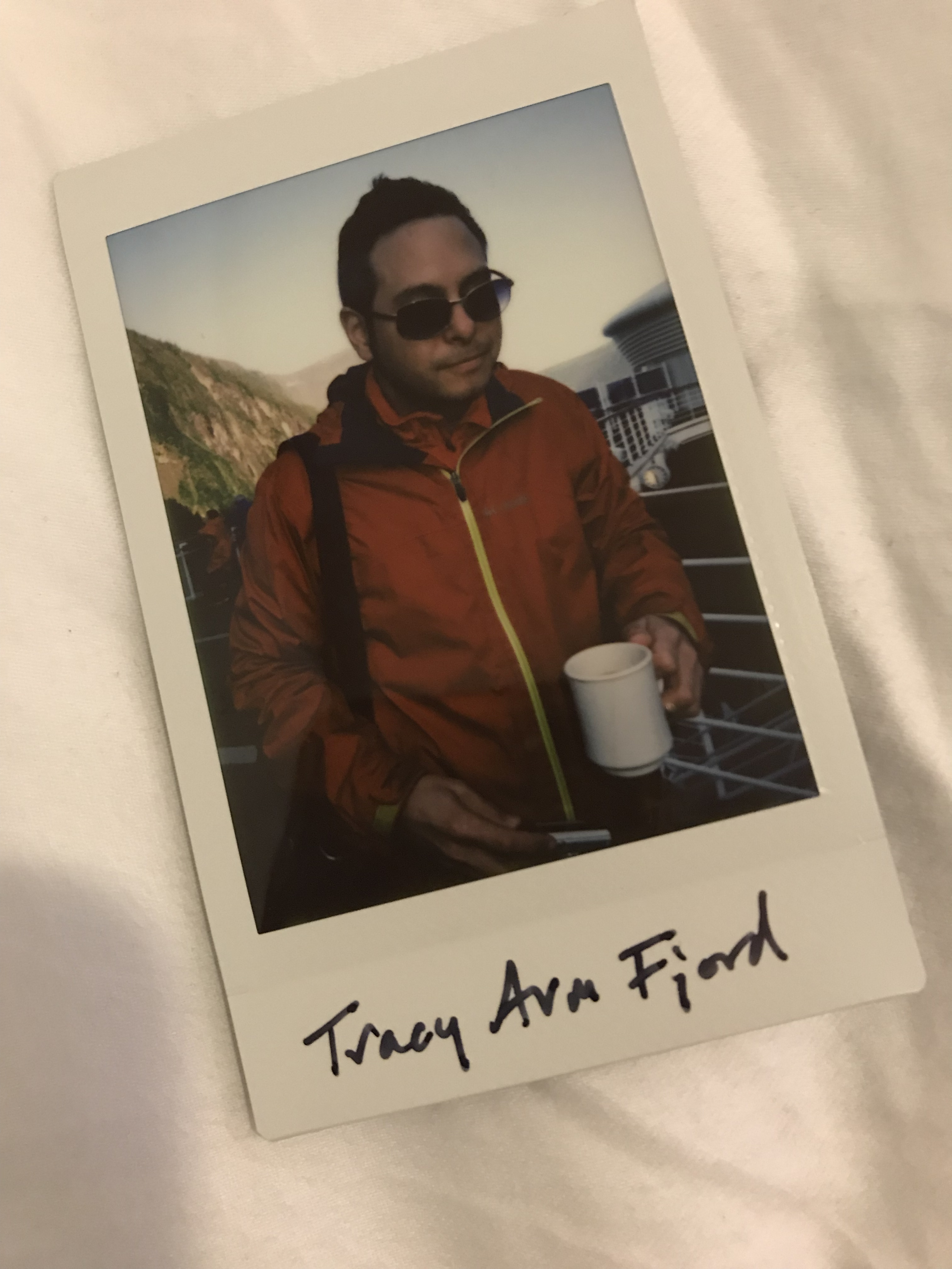 Trav, sleepy, with a cup of coffee